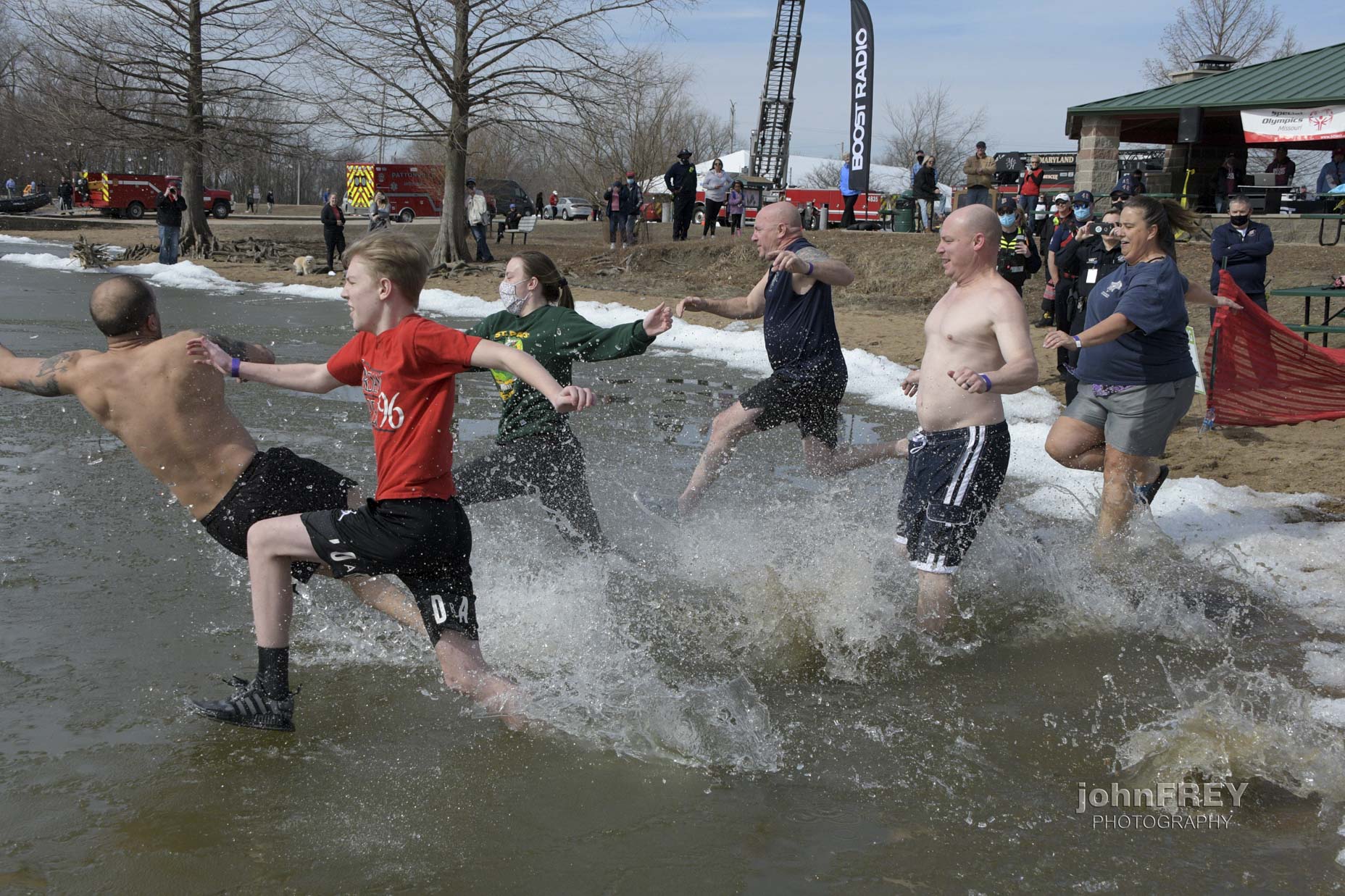 MHPD Officers run into Creve Coeur Lake during a Polar Plunge. Photo Credit John D. Frey
